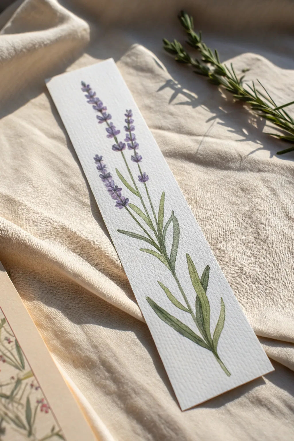 Create simple beauty with this delicate vertical lavender watercolor bookmark for your next read.