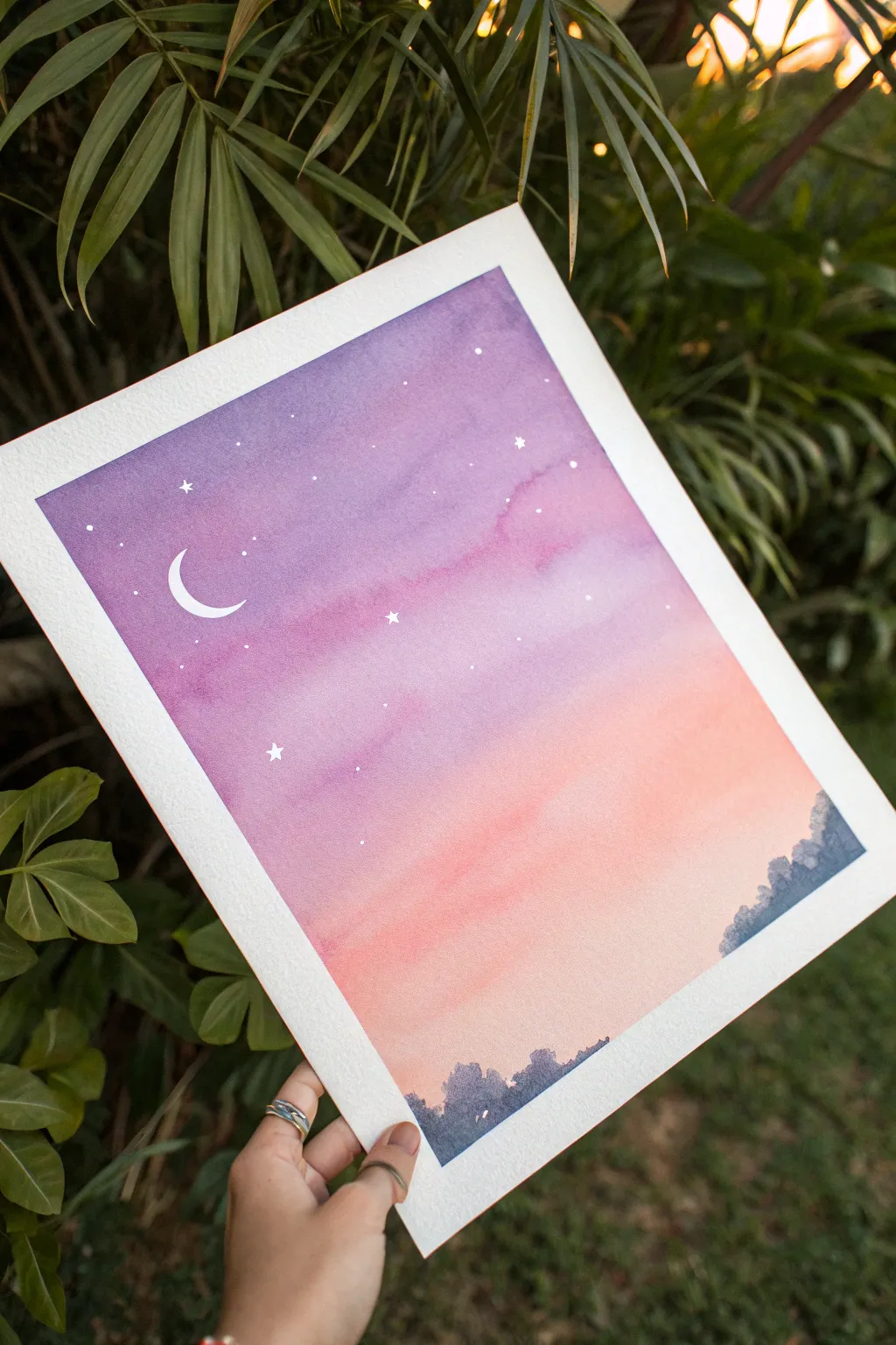 Dreamy pastel sky wash with a crisp crescent moon, perfect for an easy paper painting.