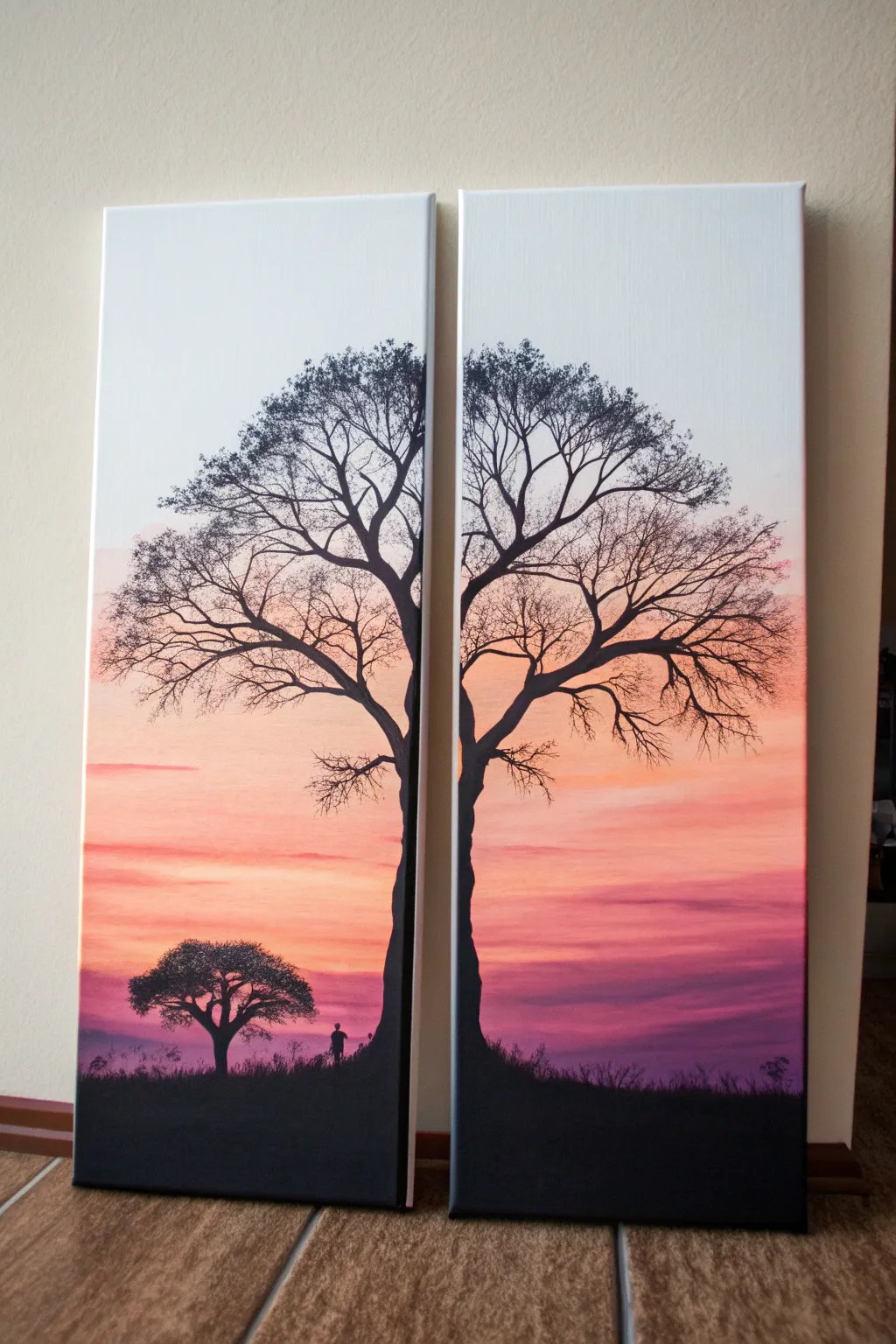 Romantic diptych painting: two trees meet to form a heart canopy against a sunset gradient sky