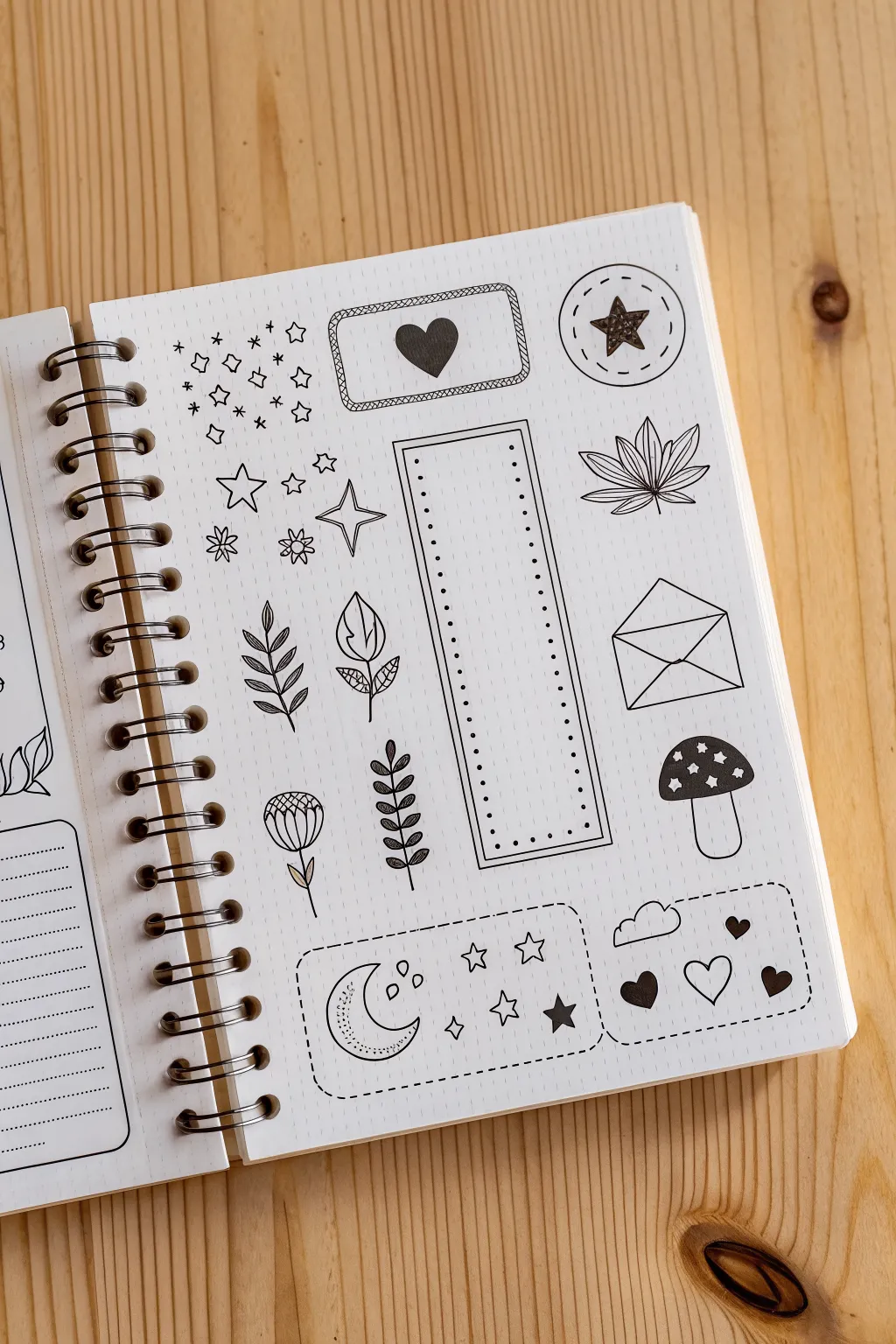 Create a chic tag and doodle sticker sheet with bold ink lines and one warm accent color