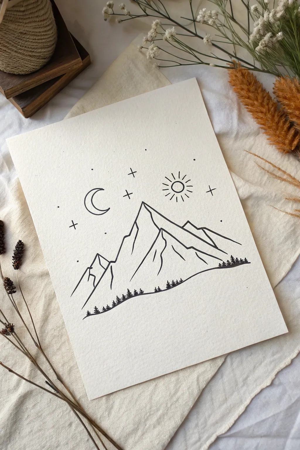 Minimal mountain line art with rising sun and tiny stars, a calm hipster doodle to try.