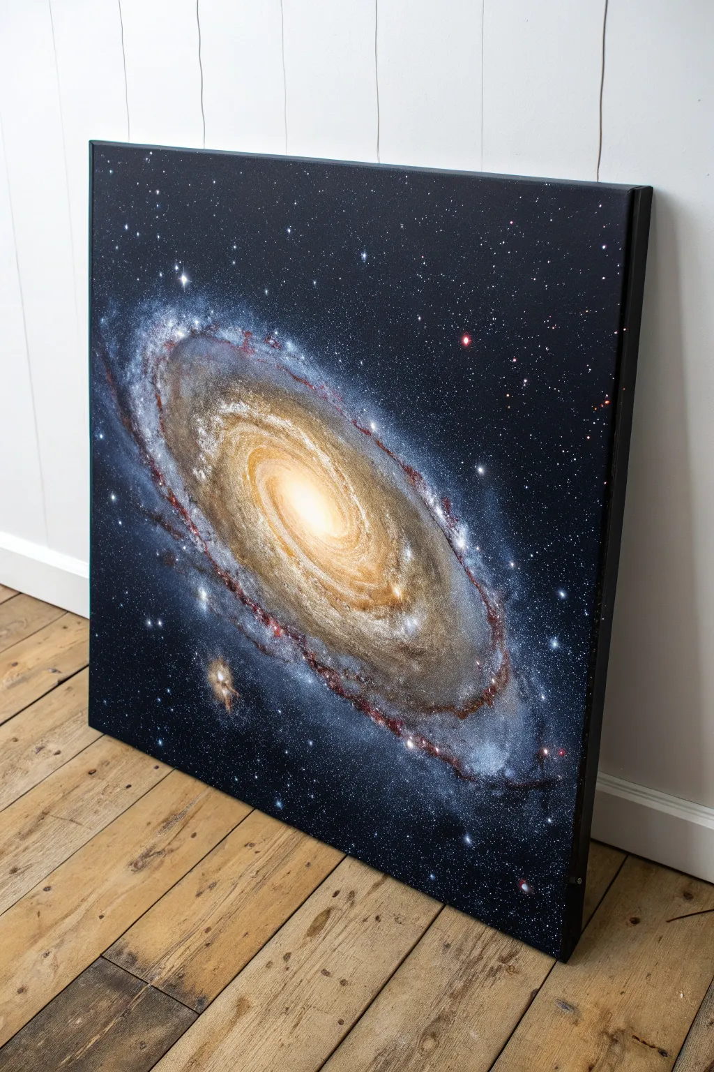 Spiral galaxy painting with a luminous core and dreamy indigo arms, minimalist and boho.