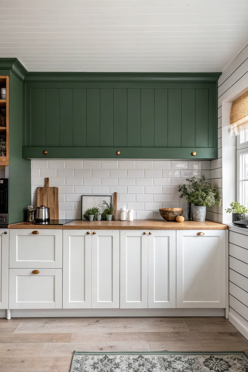Deep muted soffit band above light upper cabinets adds a crisp, modern stripe with calm contrast.