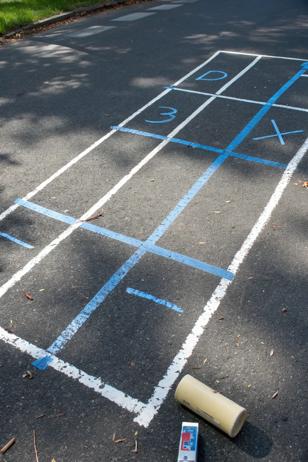 Perfect your parking spot mural layout using a simple chalk grid and blue tape for crisp lines.