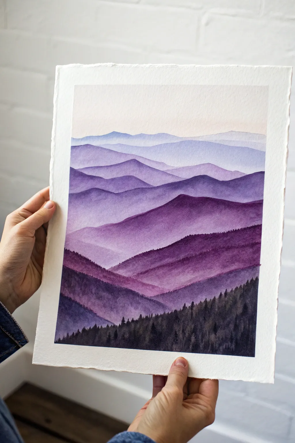 Misty purple mountain layers in watercolor, deep plum foreground fading to violet haze.