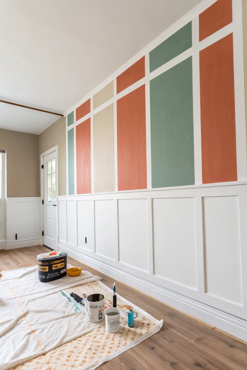 Crisp tape lined color blocks for a clean modern accent wall with a soft boho, handmade feel