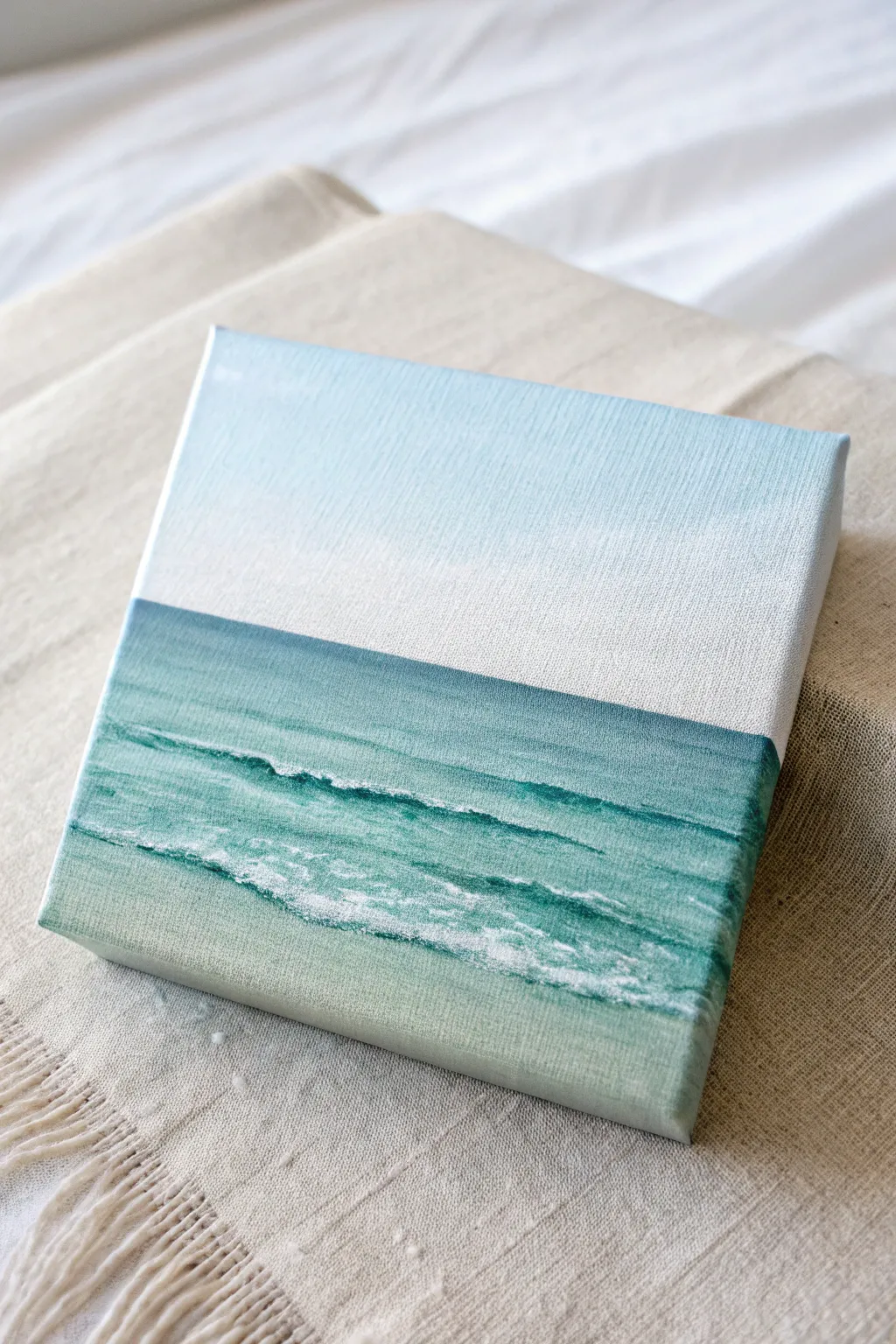Calm mini canvas ocean horizon with soft waves, minimal brushstrokes, and soothing contrast