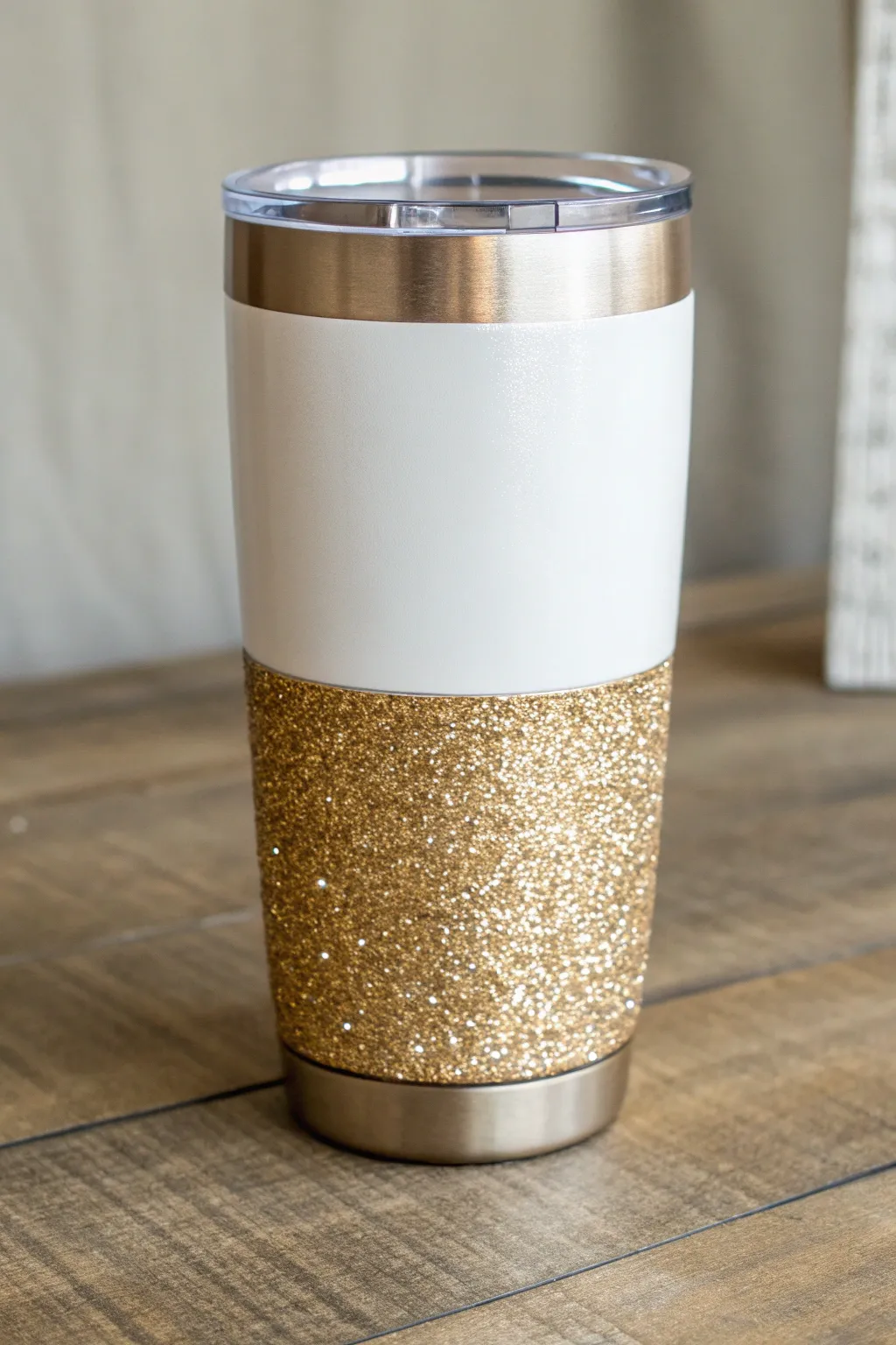 Minimalist glitter-dip tumbler base with a crisp paint line and soft boho sparkle for DIY ideas