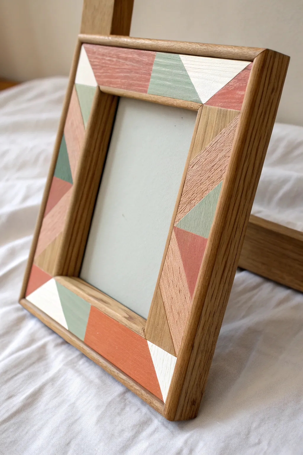 Modern tape color blocking on a wooden frame with crisp geometry and natural wood contrast