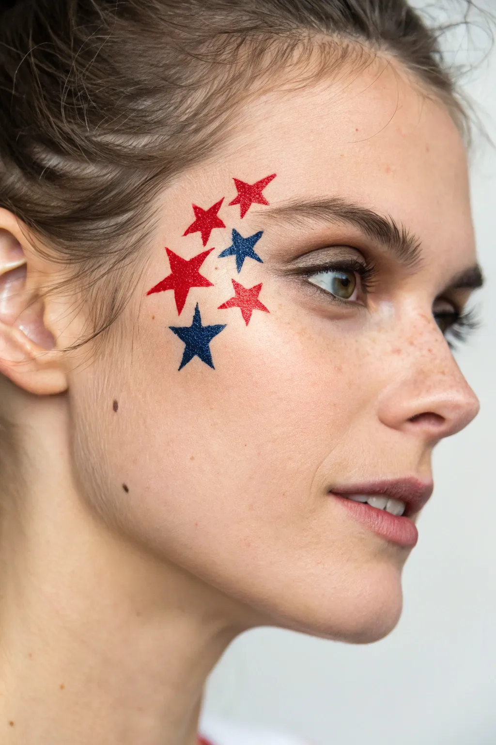 Tiny red, white, and blue star cluster at the temple for an easy, airy 4th of July look