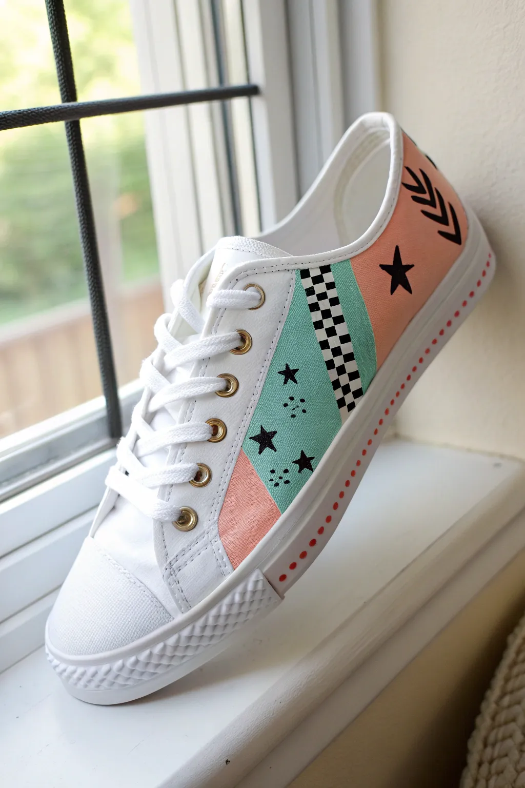 Custom sneaker side-panel art with acrylic paint pens, clean edges, bold color, minimalist vibe