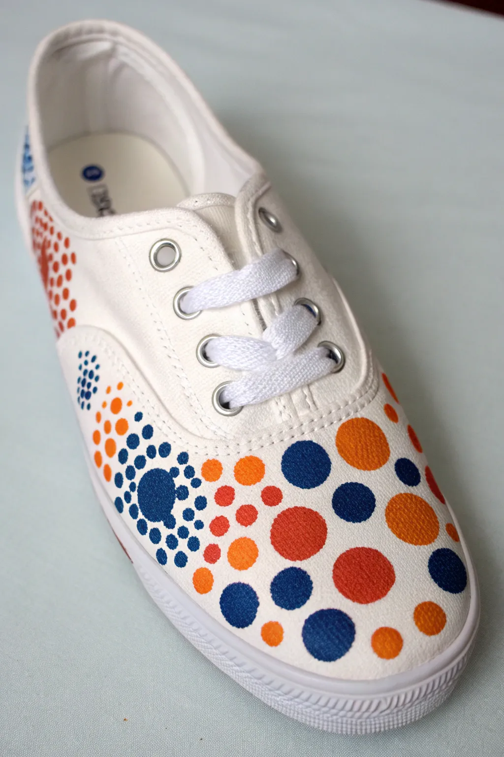 Playful acrylic polka dot clusters in bold hues for a chic minimalist-boho sneaker refresh.