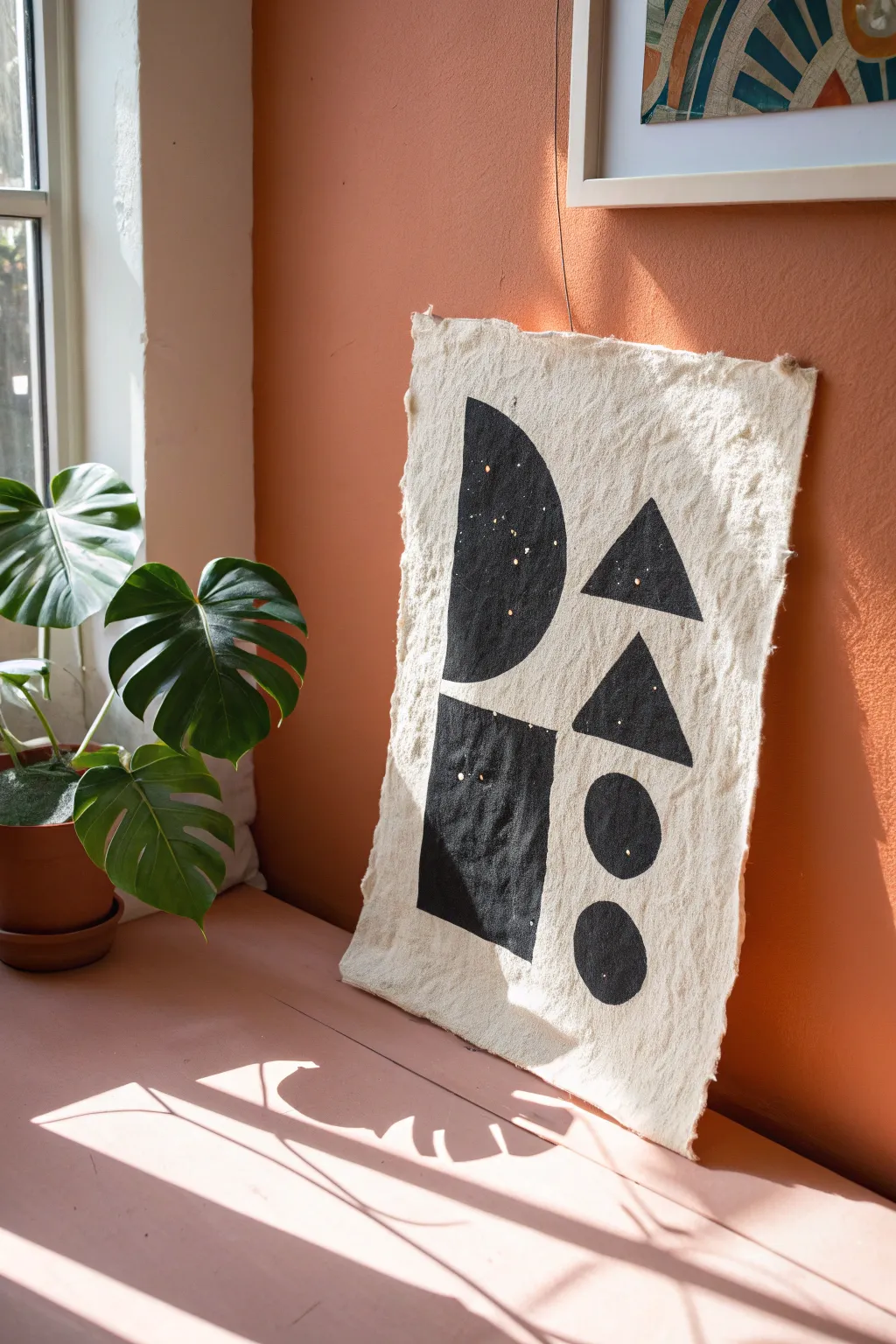 Notan asymmetrical balance with one solid form and fragmented echoes in bold, calming contrast