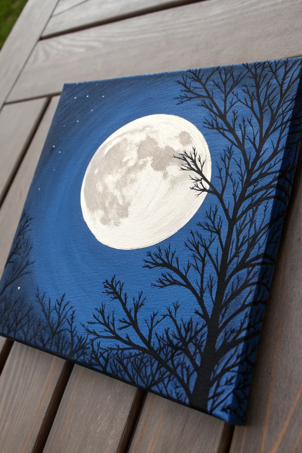 Create moody magic with this bold and beginner-friendly full moon painting idea.