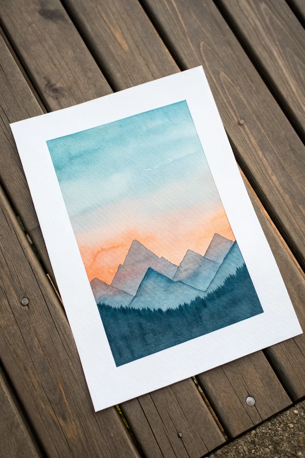 Beginner watercolor pencil: soft sky wash with bold mountain silhouette, clean and calming