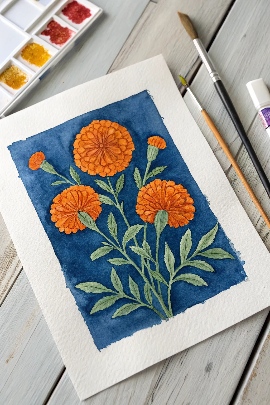 Easy folk art marigold cluster in blazing orange, perfect for beginner Mexican painting practice