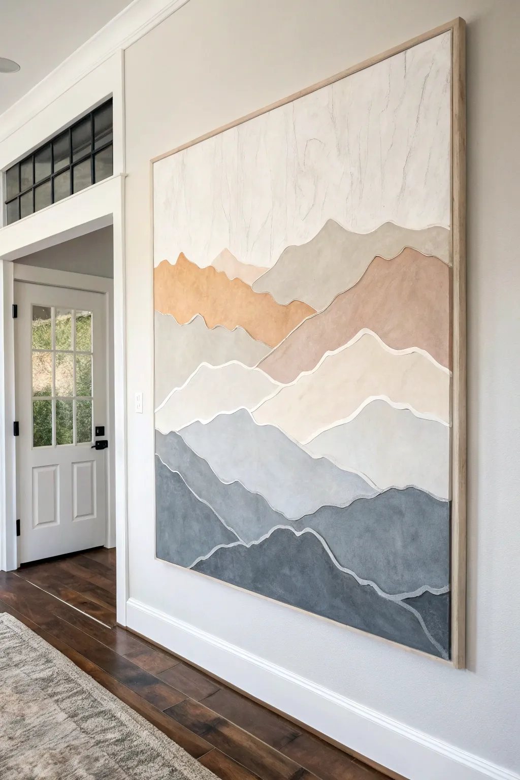 Minimal mountain layers in soft neutrals prove that simple shapes can look stunning on a big canvas.