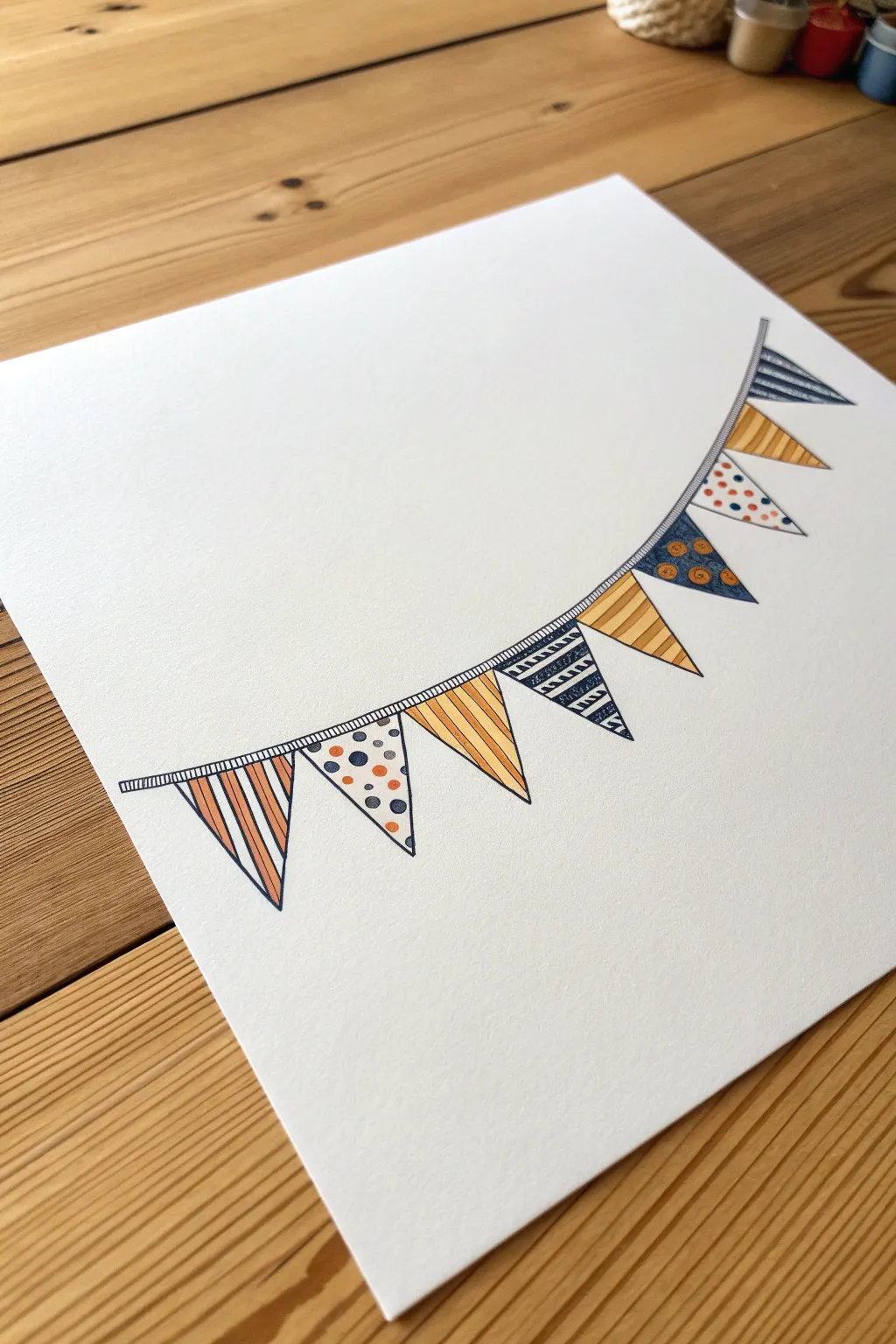 Add a festive touch to your sketchbook with these easy bunting doodles.