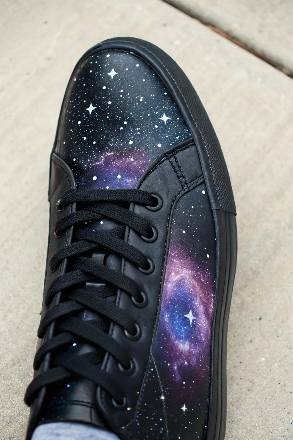 Black sneaker galaxy splatter with crisp white stars and a dreamy purple blue nebula glow