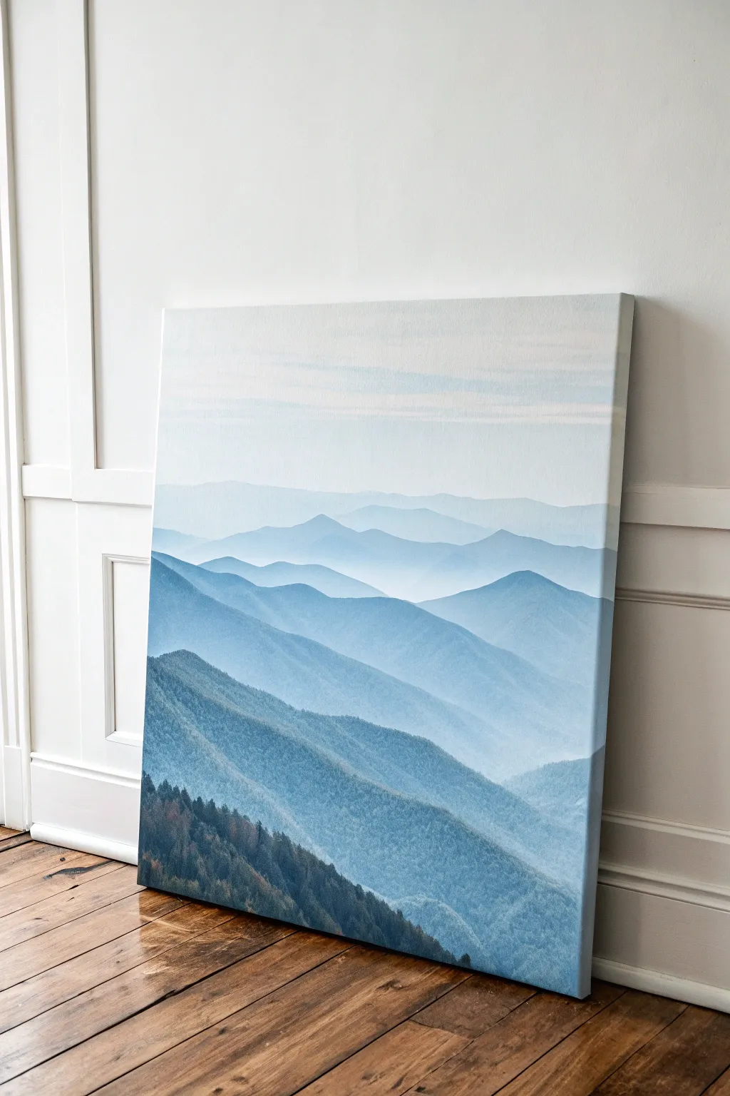 Layered mountain canvas in soft blues and grays, minimalist Scandinavian vibe with boho calm.