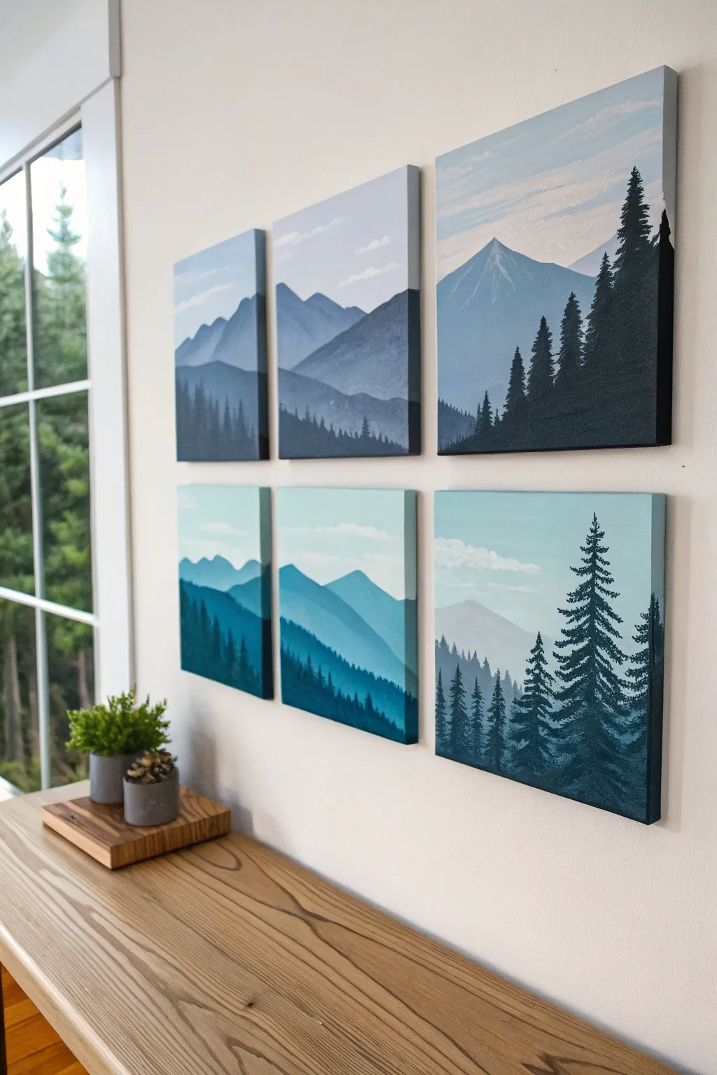 Mountains and pines canvas lineup for an easy guided painting party, crisp contrast and calm vibes.