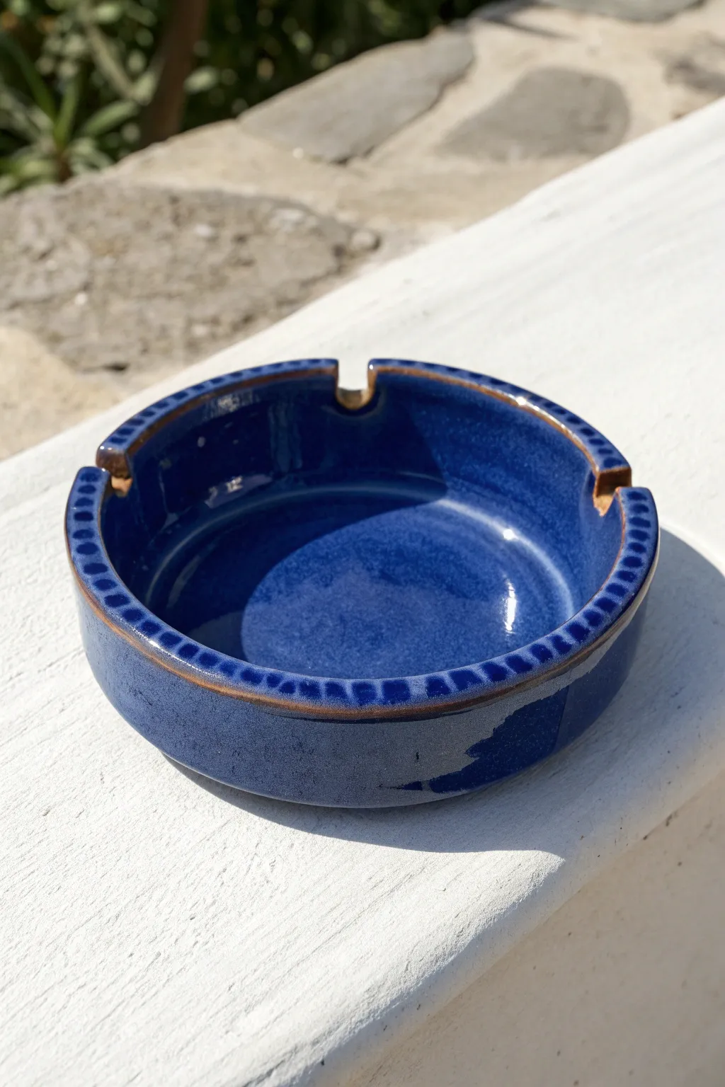 Handcrafted minimalist clay ashtray, three notches, satin glaze, calm Scandinavian styling.