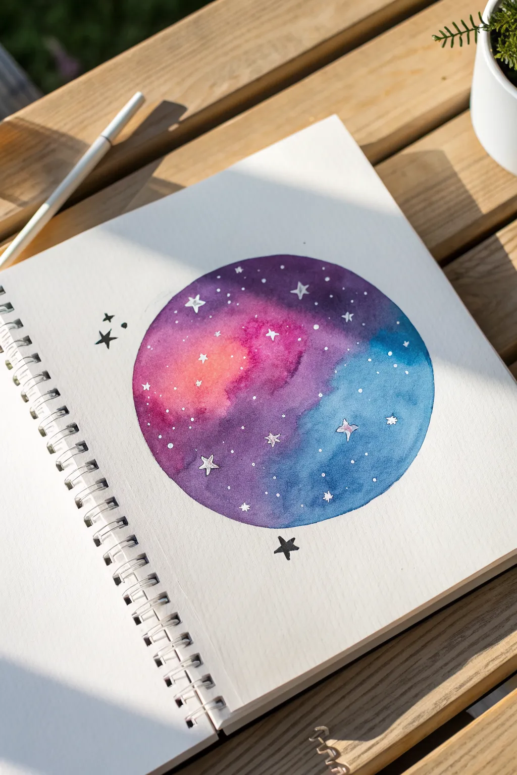 Easy galaxy circle drawing: bold purples, blues, and pinks popping on a clean white page