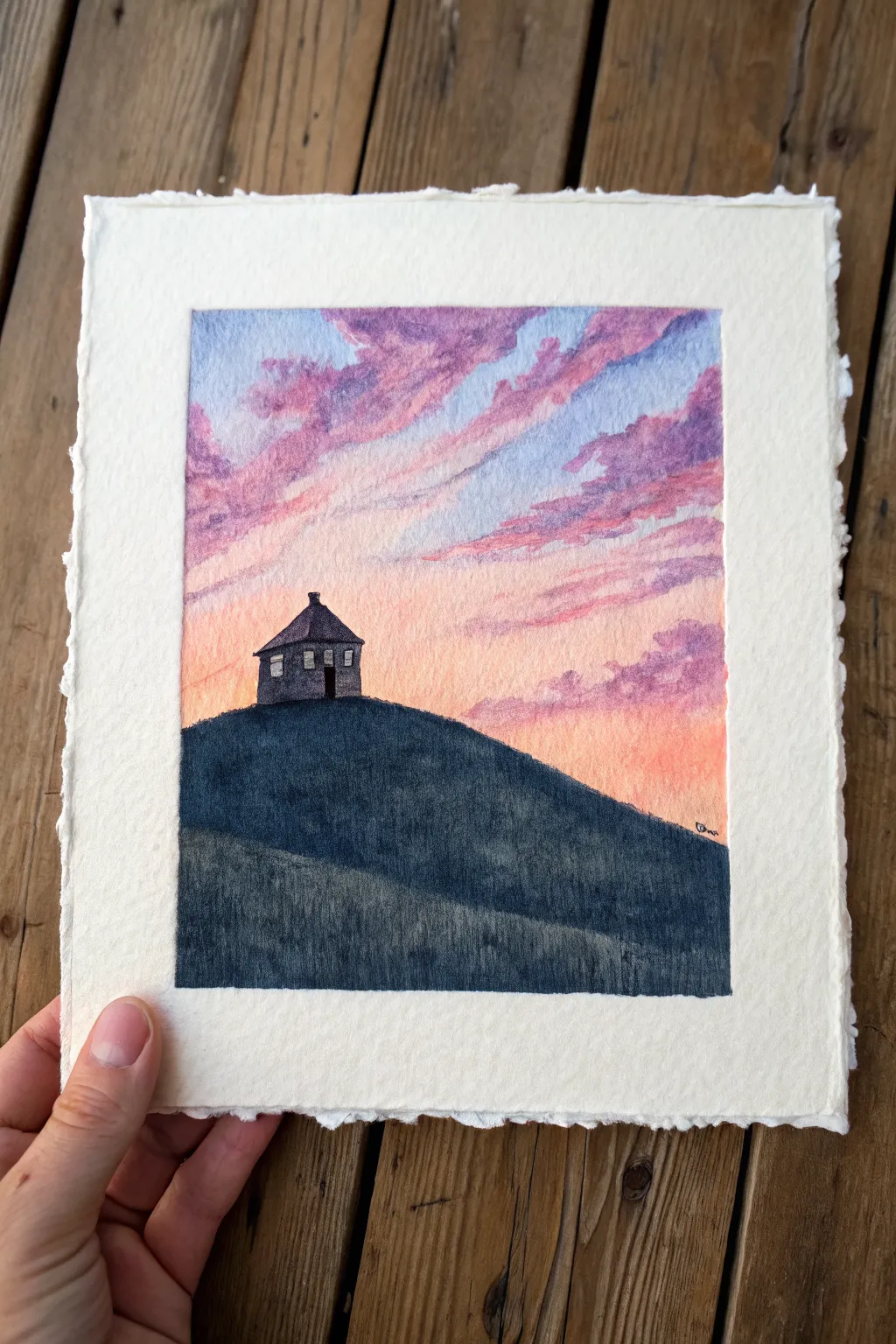 Easy oil pastel idea: a tiny house on a hill under a dreamy pink sky, minimalist and sweet