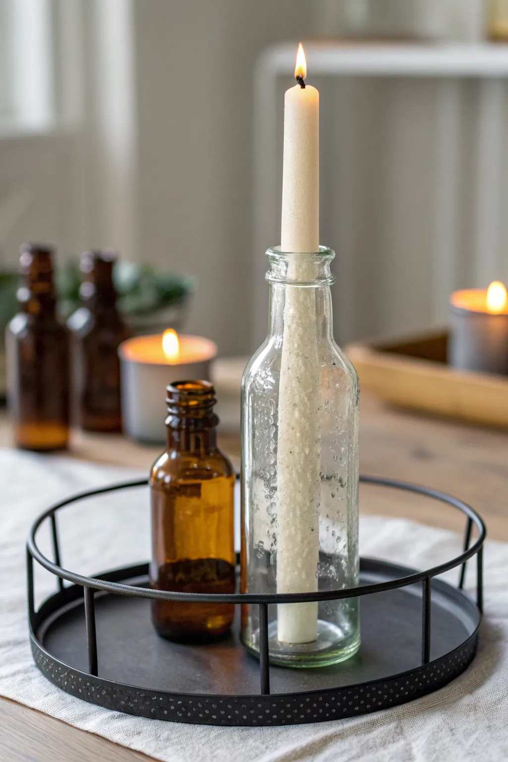 DIY bottle candle holders: a taper in a tall bottle with soft tea light accents, cozy glow
