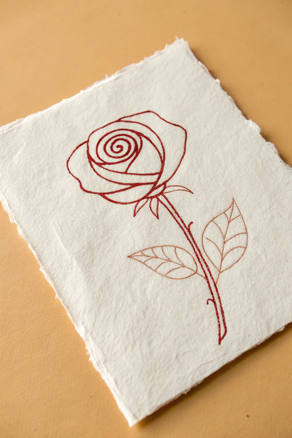 Simple rose spiral doodle in bold ink, perfect quick flower drawing for beginners