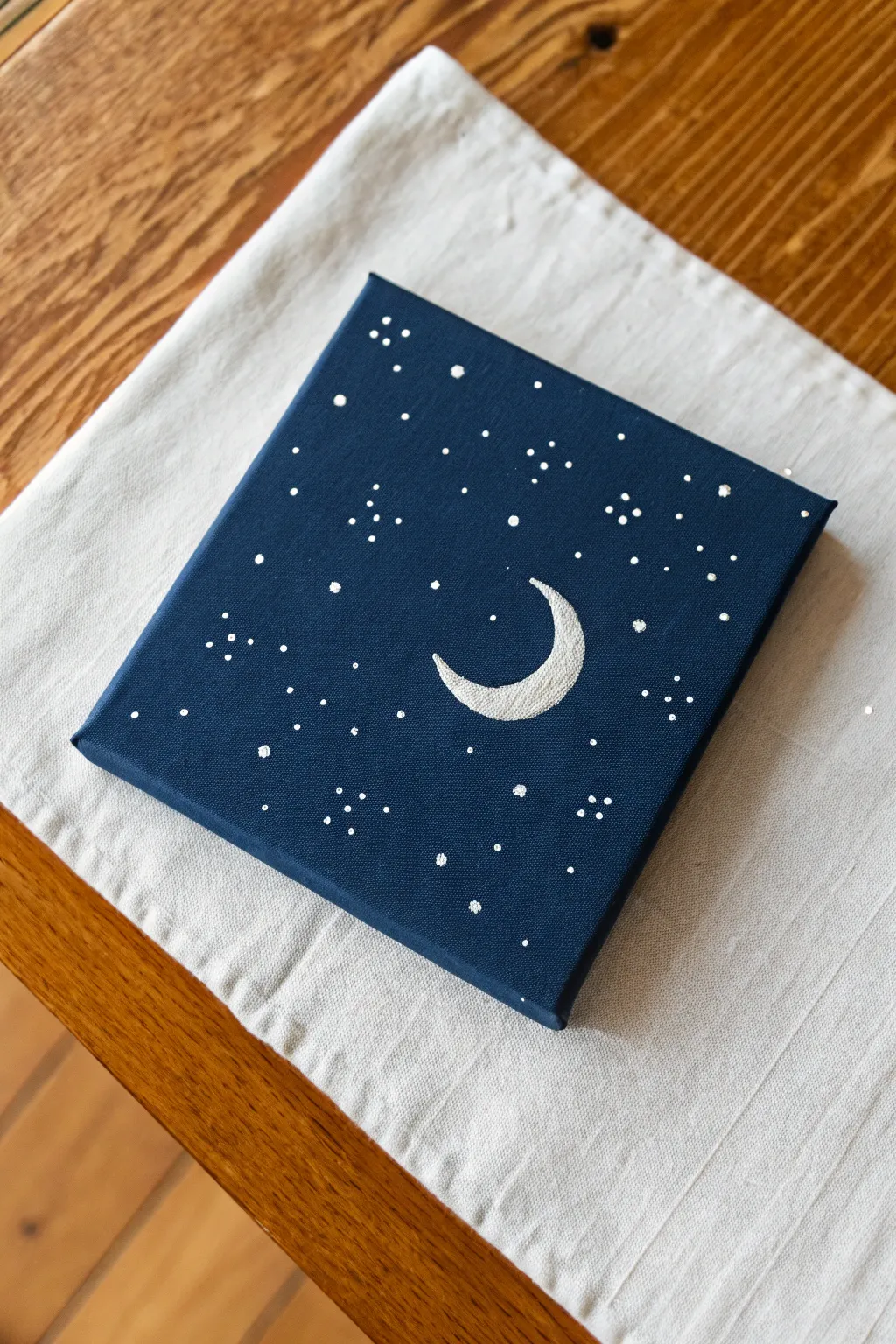 Minimalist moon magic. 🌙 A simple yet striking mini painting idea to try tonight.