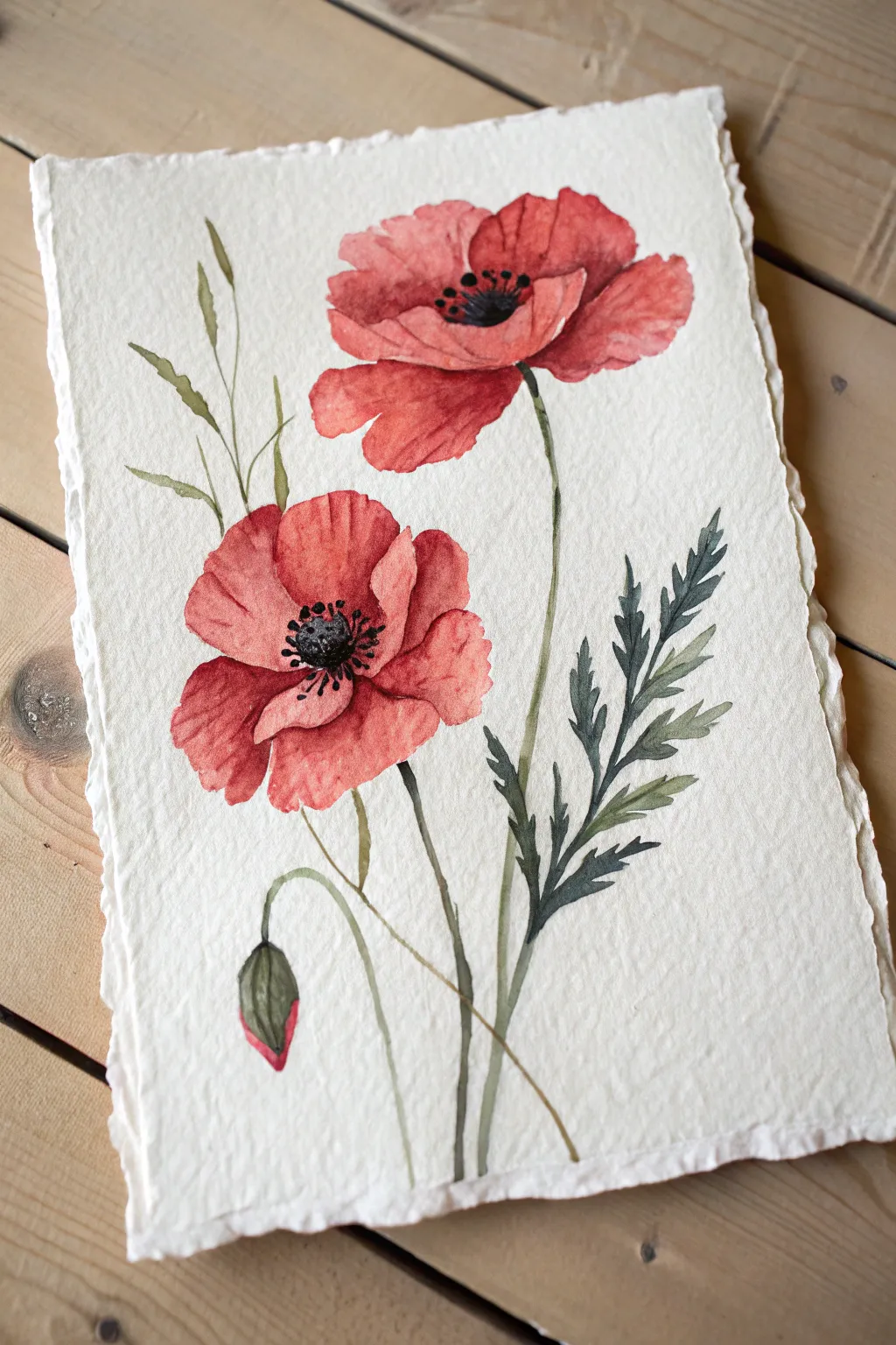 Loose poppy blooms: rounded scarlet petals and dark centers on a clean minimalist background