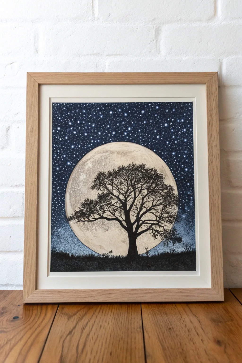 Minimalist pointillism: moonlit tree silhouette set in a sparkling blue-purple dotted night sky.