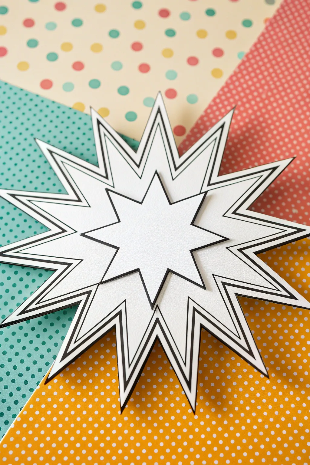 Bold jagged starburst bubble on pop pattern backdrop, minimalist yet vibrant for DIY pop art.