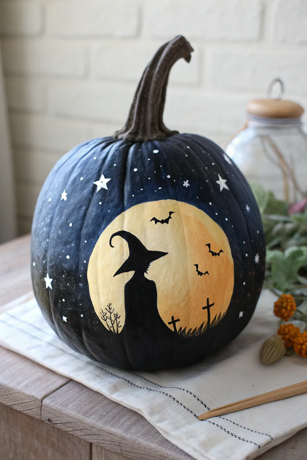 Handmade witch hat night sky pumpkin with stars and moon, minimalist boho vibe, bold contrast
