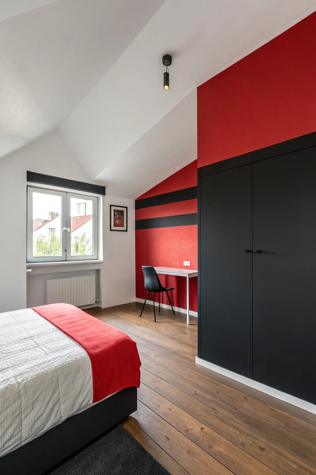 Modern red and black color blocking turns a quiet corner into a sleek, defined nook