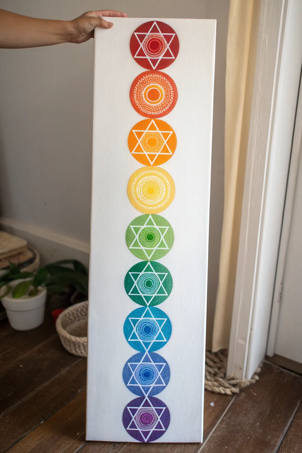 Paint a glowing chakra light column with bold stacked hues for a calm, modern spiritual vibe