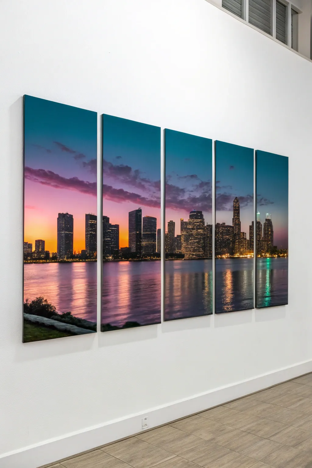 Dusk city skyline across five panels, bold lights and reflections for a calm modern wall.