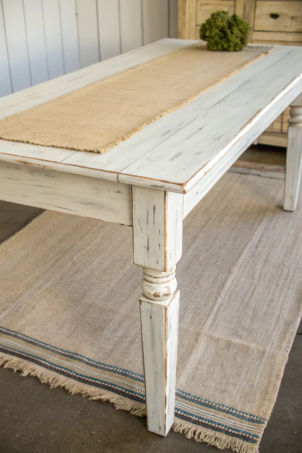 Farmhouse distressed painted table with soft sanded edges and a timeless, worn-in charm