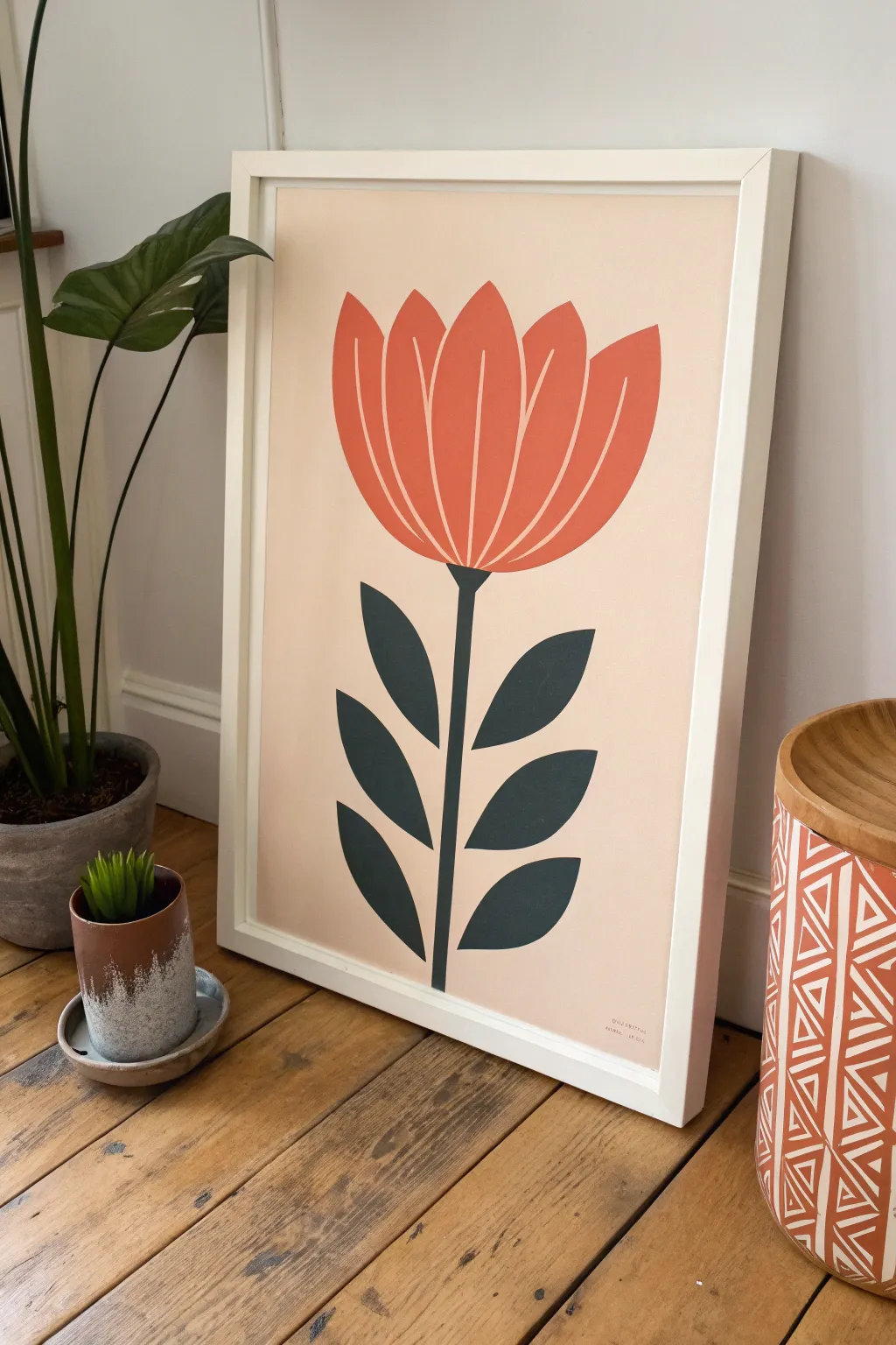 Graphic three-color bloom: coral petals, sand backdrop, olive stems for a bold minimalist vibe.