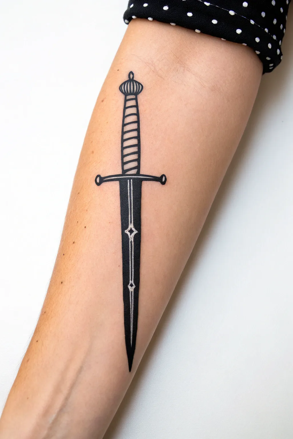 Easy sword forearm paint with clean lines, small guard, and bright shine accents