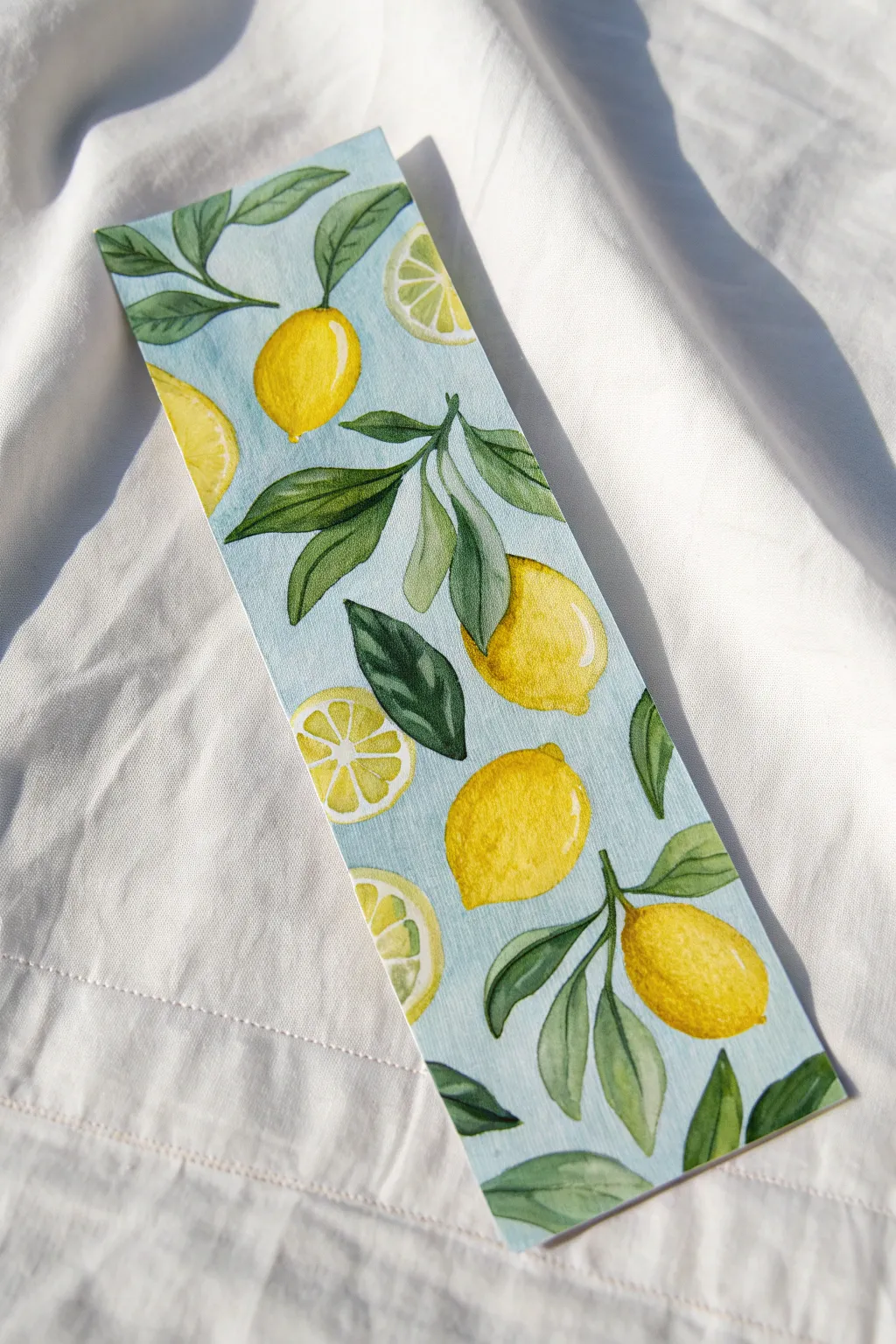 Add a zesty twist to your reading list with this hand-painted lemon bookmark pattern.
