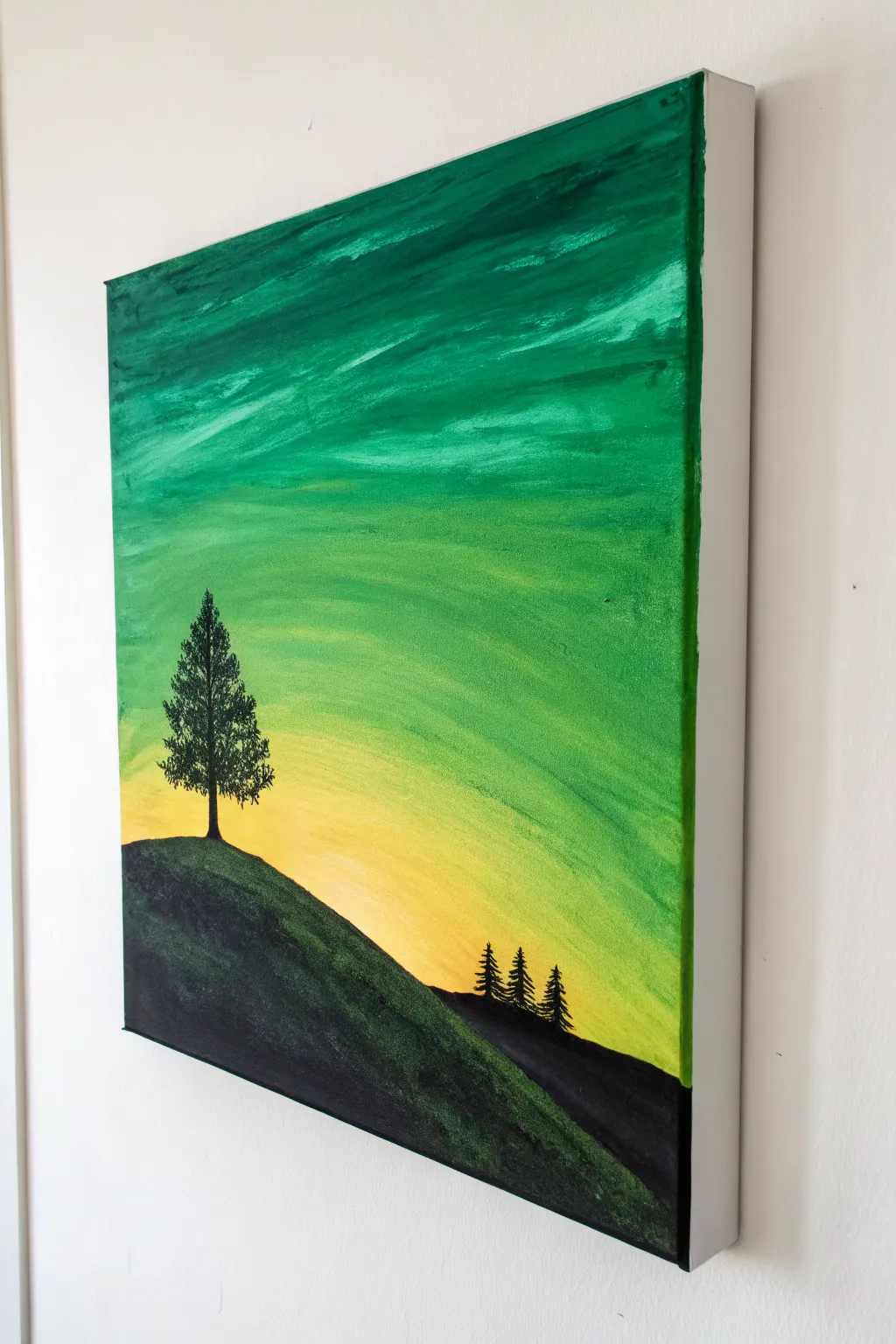 Minimal green-sky sunset canvas with bold black hills, simple shapes, cozy boho calm