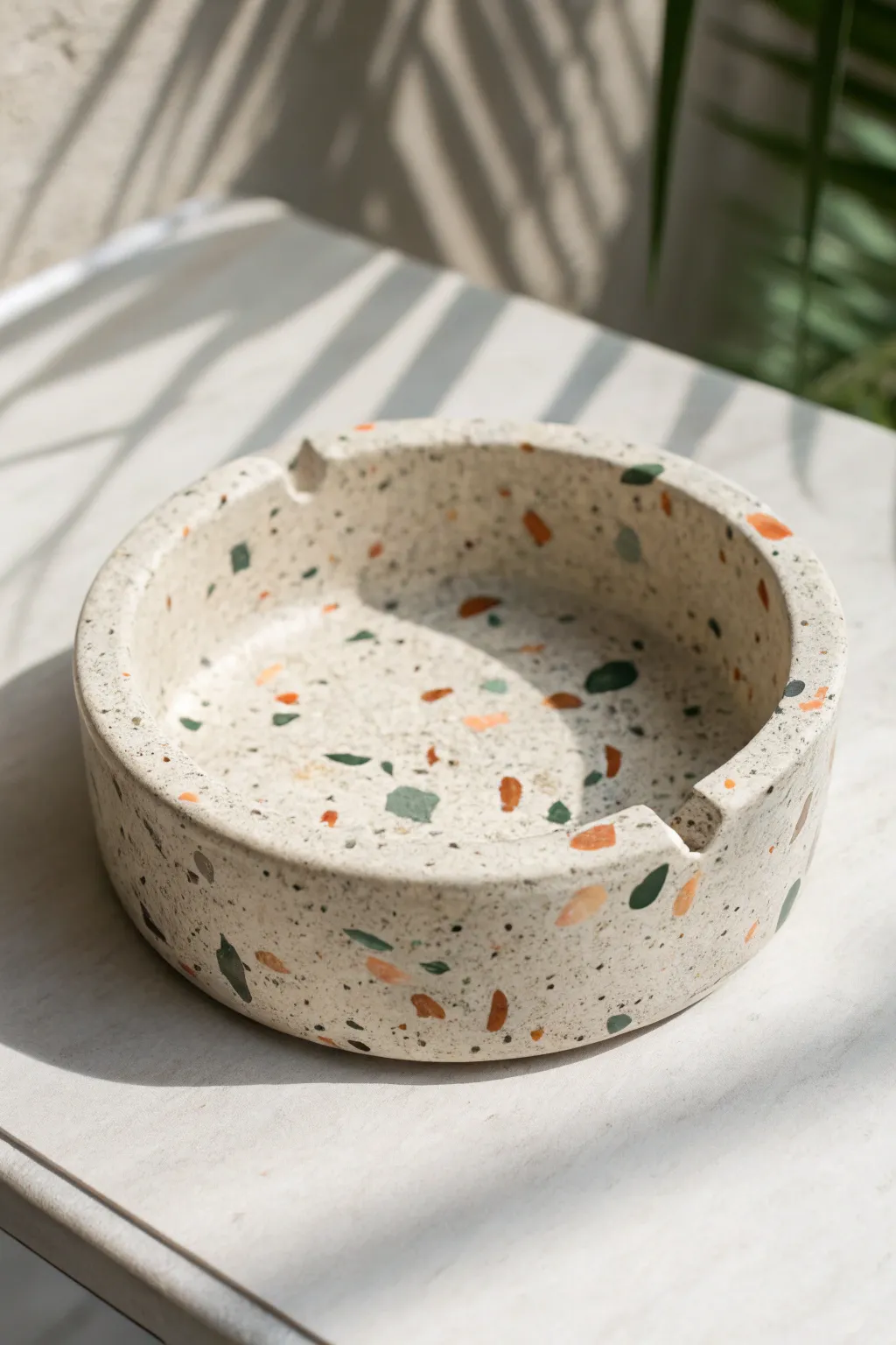 Terrazzo speckled clay ashtray in soft pastels, a minimal DIY idea with boho charm.
