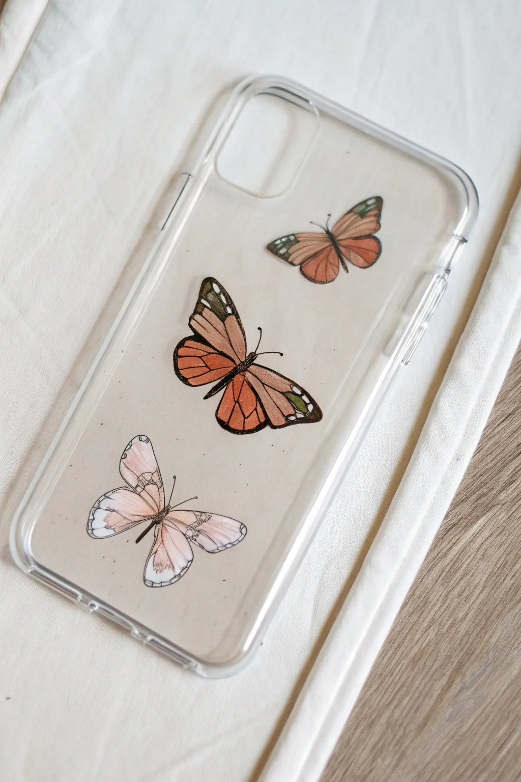 Minimal butterfly clear phone case painting with soft boho colors and lots of airy negative space
