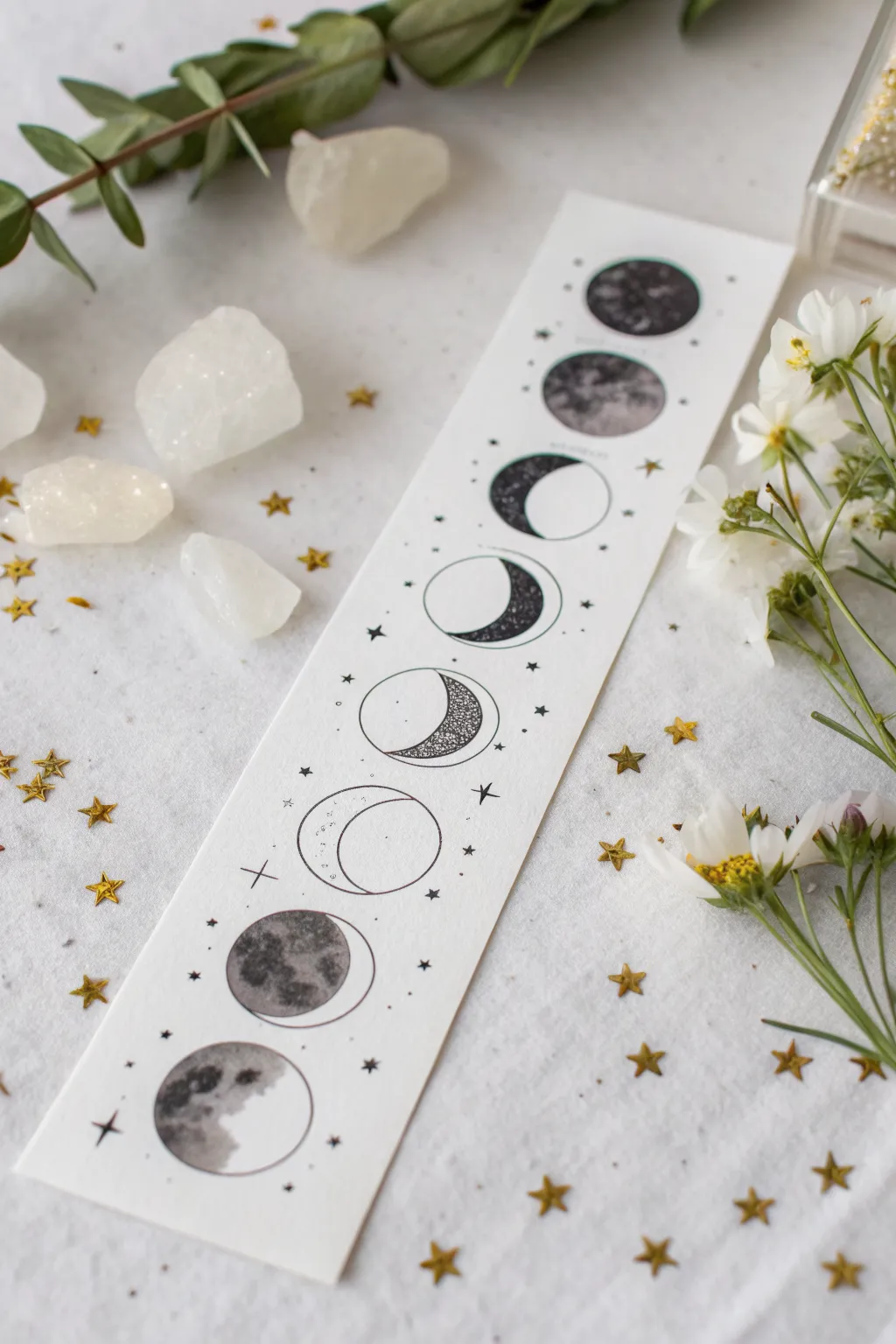 Simple moon phases mini strip with tiny sparkles, a cute minimal doodle idea to recreate