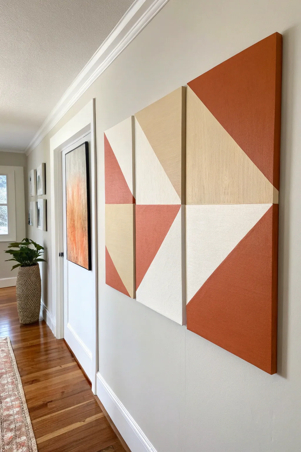 Abstract color-block triptych in soft neutrals with a terracotta pop for a calm dorm vibe