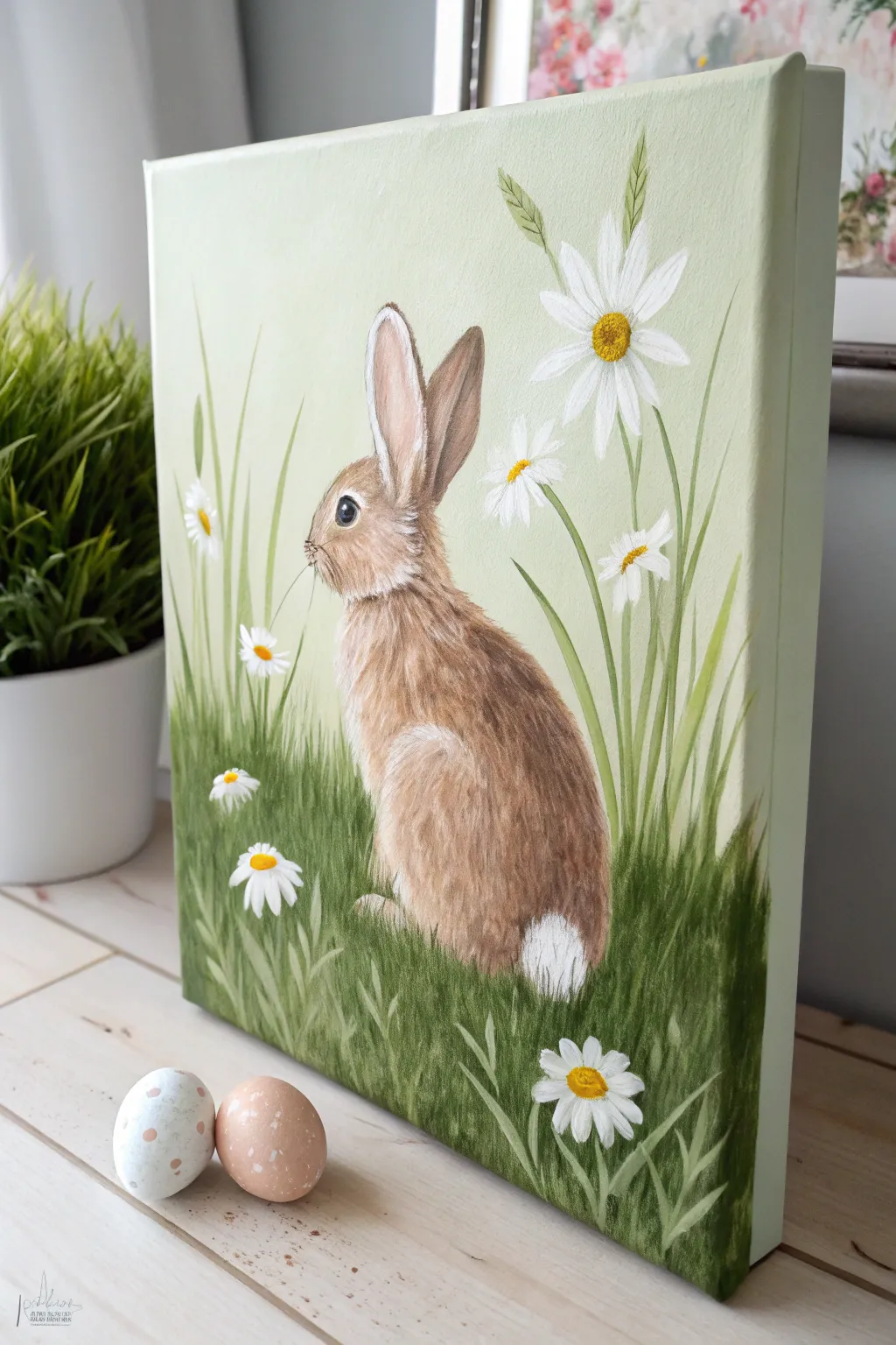 Minimal bunny butt in daisies with tiny eggs, a sweet and elegant Easter canvas idea