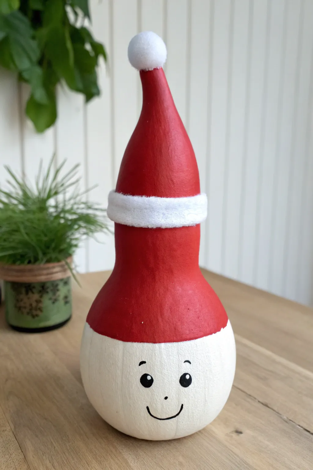 Minimal Santa hat gourd in cozy Nordic tones, an easy festive paint idea with optional face.