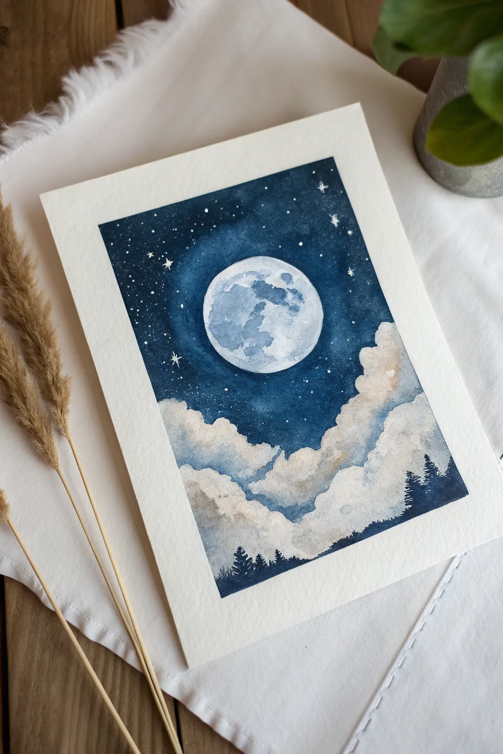 Paint a dreamy moonlit night sky with soft clouds, crisp moon glow, and calming midnight blues